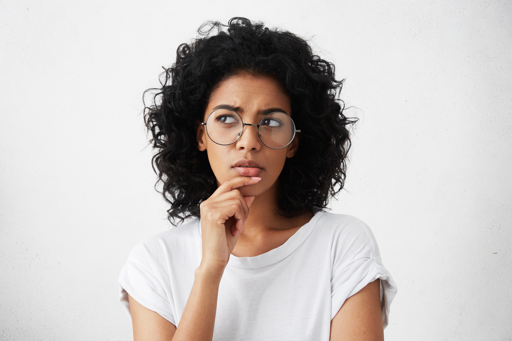 woman with insurance questions looks confused